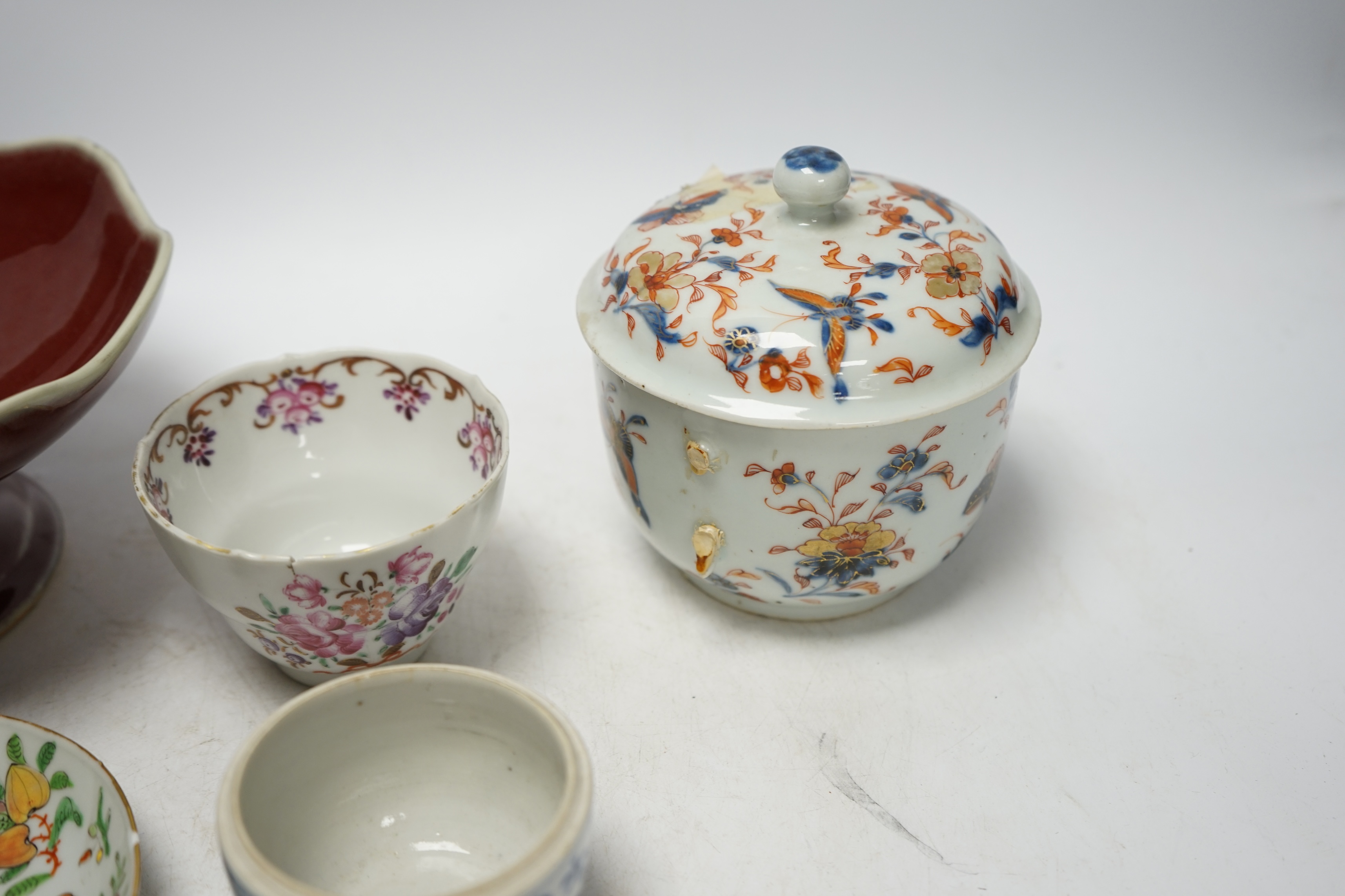 Chinese ceramics to include a sang de boeuf pedestal bowl and a famille rose dish, 20cm diameter. Condition - pedestal dish and one other good, others poor